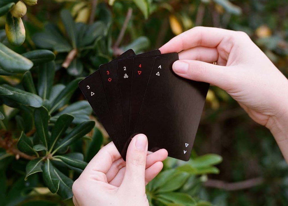 A Hand of Minim Playing Cards in Black