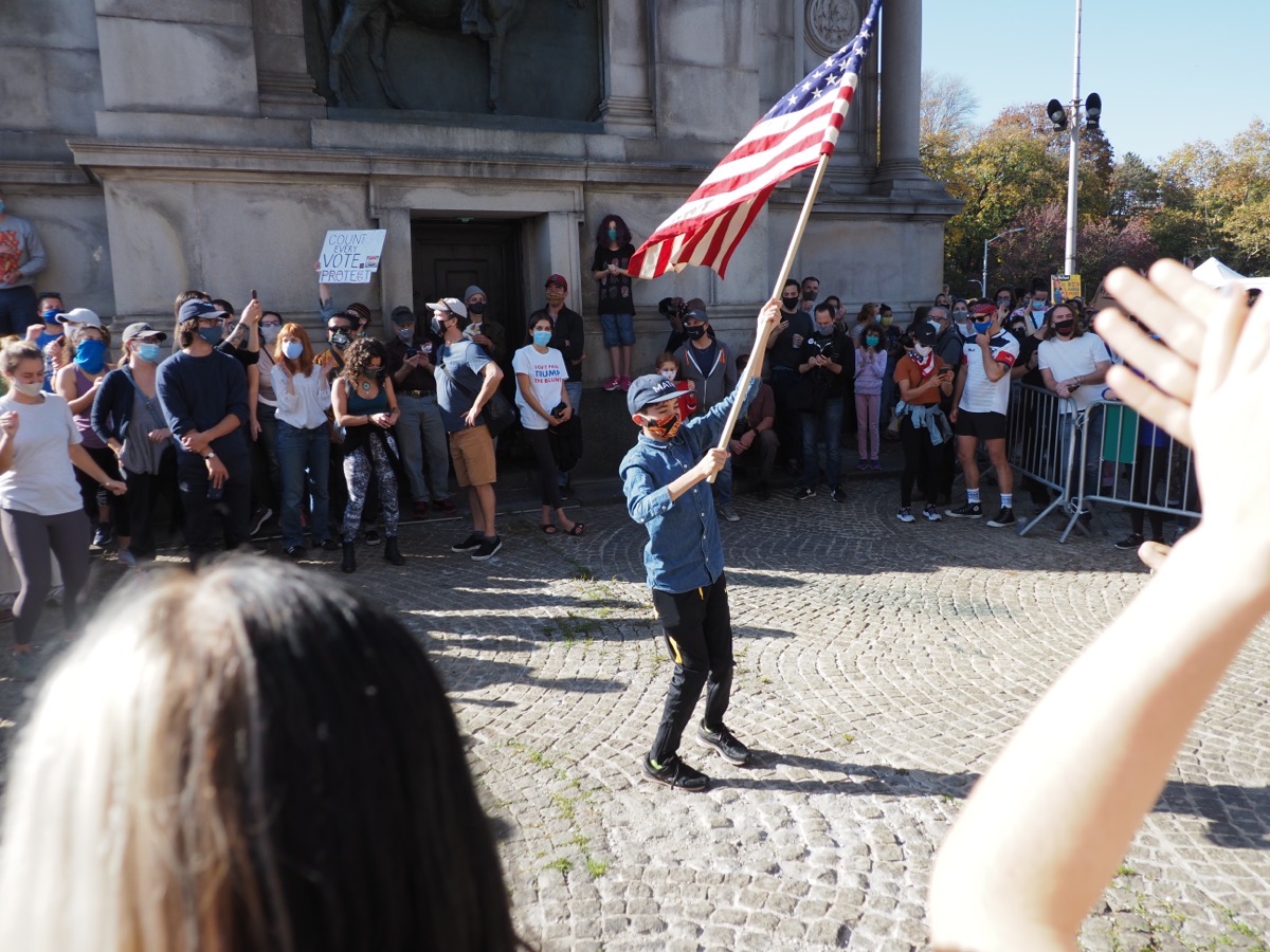 A boy waves an American flag at Grand Army Plaza, Brooklyn, Copyright 2020 by Khoi Vinh