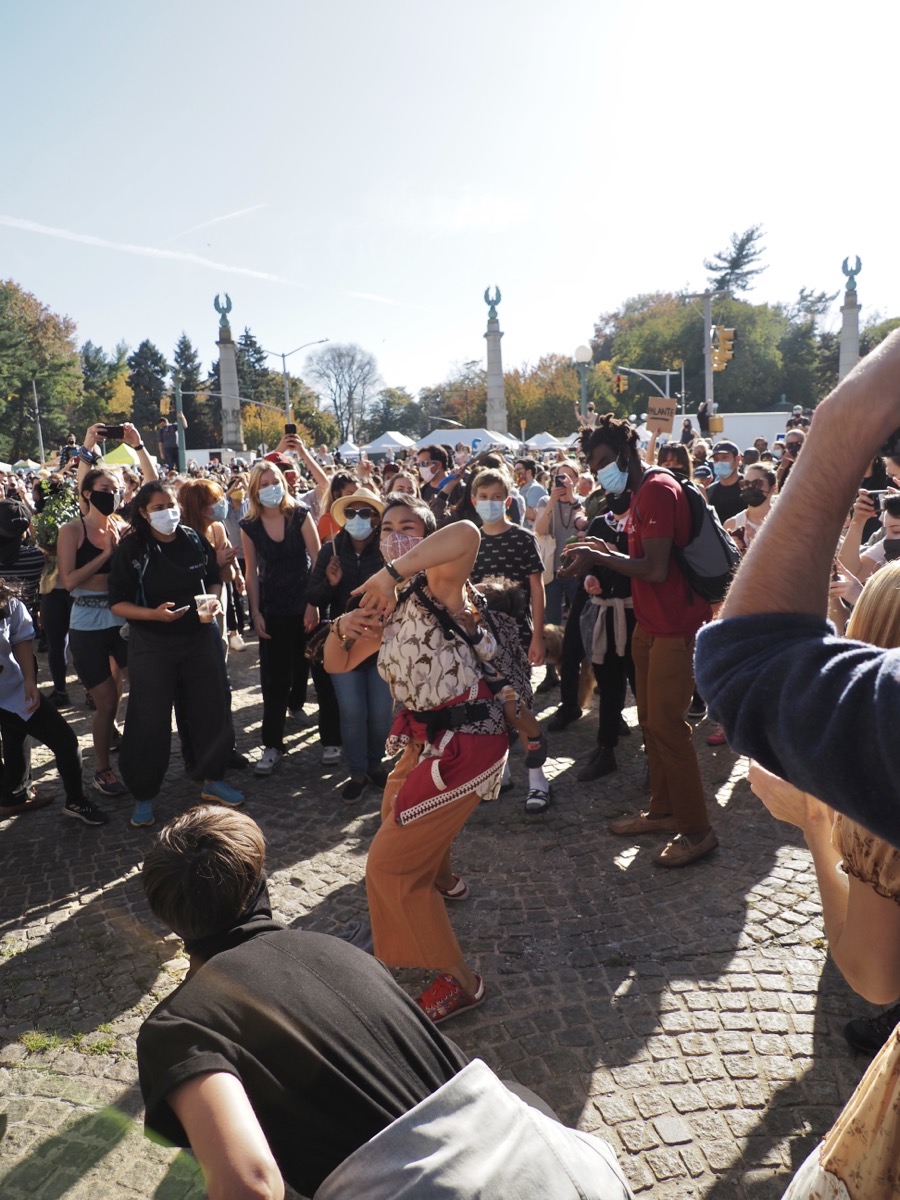 A woman dances at Grand Army Plaza, Brooklyn, Copyright 2020 by Khoi Vinh